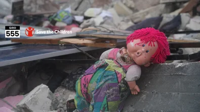 CH1769929-Toys-buried-in-the-rubble-of-destroyed-buildings-after-earthquake-in-Afrin-District-Aleppo-Governorate-Northwest-Syria.png