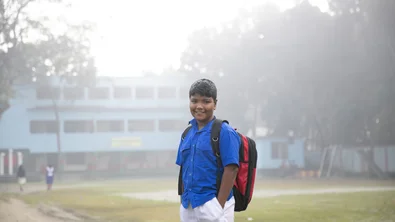 CH1651500-Sohan-9-smiles-on-his-way-to-school-in-Rajbari-District-Bangladesh.JPG