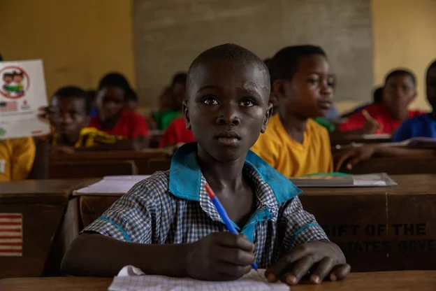 CH1681456-A-primary-school-student-in-class-at-their-school-in-Benue-State-Nigeria.aspx%3Fwidth%3D1200%26height%3D800%26ext%3D.jpg.webp