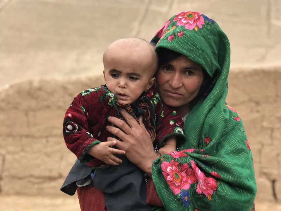 CH1653487-Khal-Mirza-15-months-with-his-mother-Maryam-at-their-home-in-Faryab-province-Afghanistan.aspx%3Fwidth%3D1200%26height%3D900%26ext%3D.jpg.webp