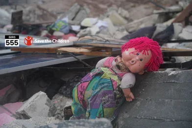 CH1769929-Toys-buried-in-the-rubble-of-destroyed-buildings-after-earthquake-in-Afrin-District-Aleppo-Governorate-Northwest-Syria.png