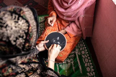 CH1748987-Nasreen-s-teacher-shows-her-how-to-embroider-at-Save-the-Children-s-vocational-training-centre-in-Afghanistan.jpg