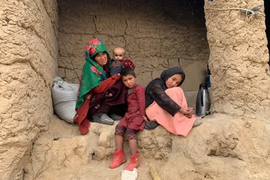CH1653551-Khal-Mirza-with-his-family-at-their-home-in-Faryab-Province