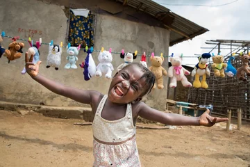 ch1248413-alice-4-plays-near-her-home-outside-white-plains-liberia-alice-was-named-after-alice-the-midwife-who-delivered-her_3