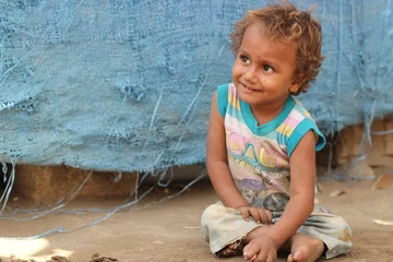 ch1587195-nusair-smiles-as-he-sits-outside-his-home-in-yemen-he-was-successfully-treated-for-malnutrition_2 ch1587195-nusair-smiles-as-he-sits-outside-his-home-in-yemen-he-was-successfully-treated-for-malnutrition_2